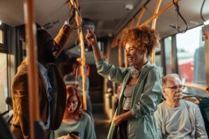 Two Happy People looking at each other on the bus