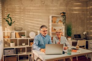 A couple looking at a computer screen