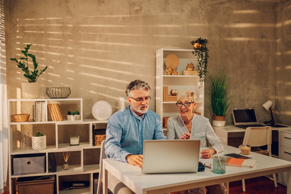 A couple looking at a computer screen
